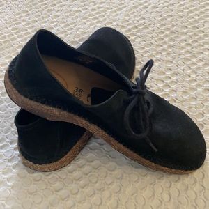 Black suede Birkenstock’s
